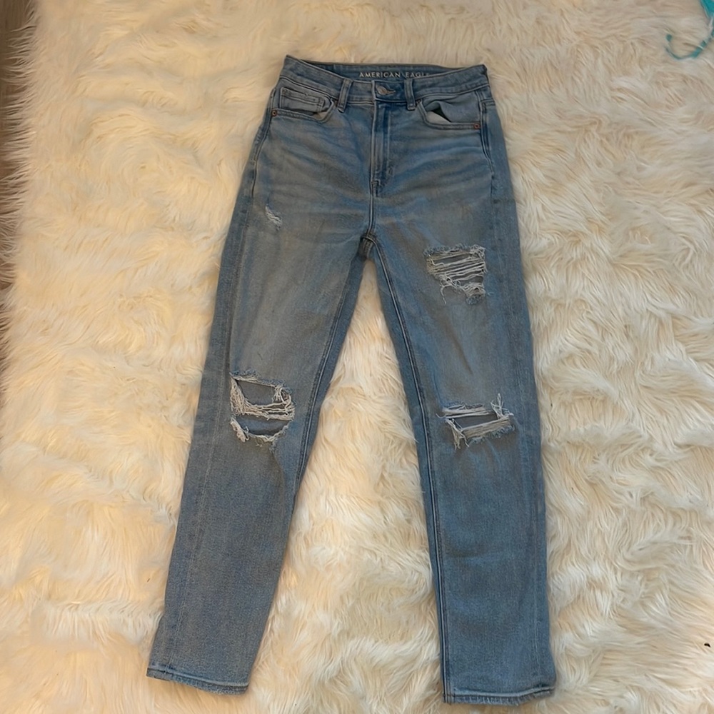 American Eagle high rise light wash denim stretch mom jeans with rips size 2